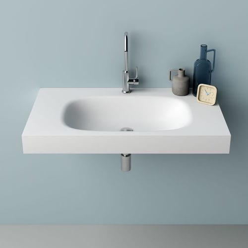 Integrated washbasin - STRETCH - PLANIT - Corian® / with counter / rectangular