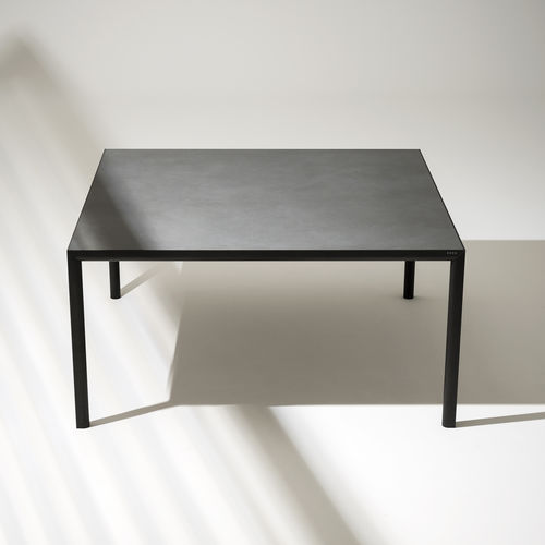 Contemporary dining table - PLEIN AIR 007 - RODA - glass / sandstone / lacquered aluminum base