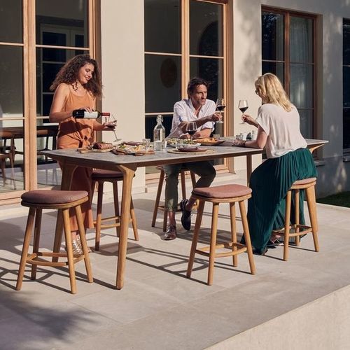 Contemporary high bar table - Torsa - MANUTTI - ceramic / teak base / rectangular
