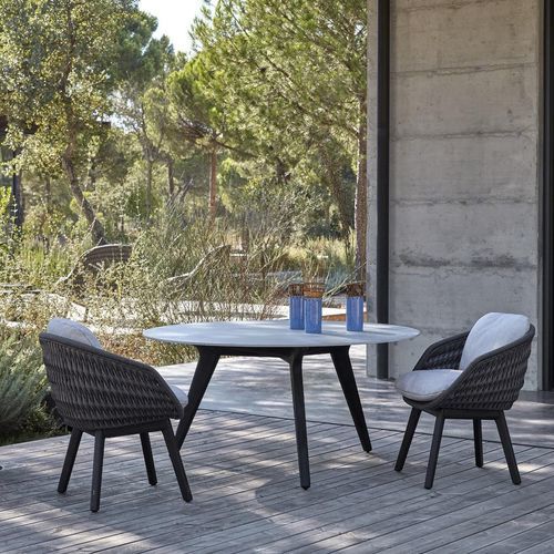 Contemporary dining table - Torsa  - MANUTTI - ceramic / marble / teak base