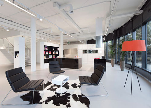 Contemporary fireside chair - RELOUNGE - DIETIKER - leather / commercial / for public building