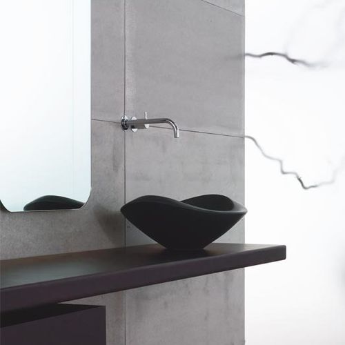 Countertop washbasin - NIDO - Rapsel International Srl - ceramic / with adjustable mirror / sculptural