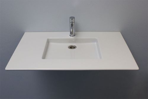 Wall-mounted washbasin - ALBEUS - Rapsel International Srl - ceramic / with counter / rectangular