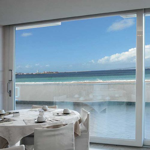 Tilt-and-slide patio door - COCIF SOCIETA' COOPERATIVA - lift-and-slide / PVC / double-glazed