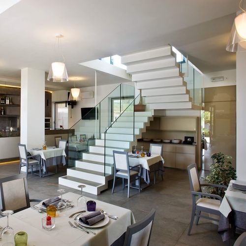 Half-turn staircase - A 236 - METALL CONCEPT - stone step / metal frame / commercial