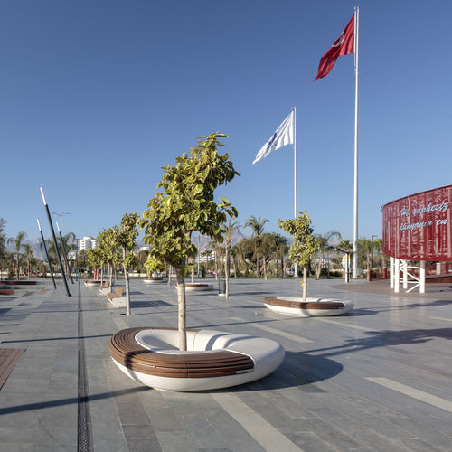 Original design public bench - LORENZ - METALCO - hardwood / engineered stone / with backrest