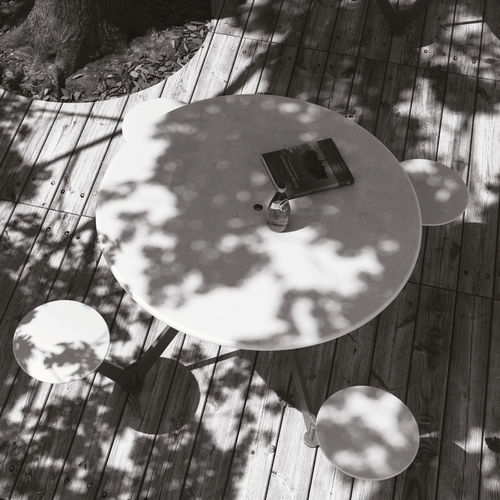 Contemporary picnic table - AIR – CIRCLE - METALCO - painted steel / HPL / steel base