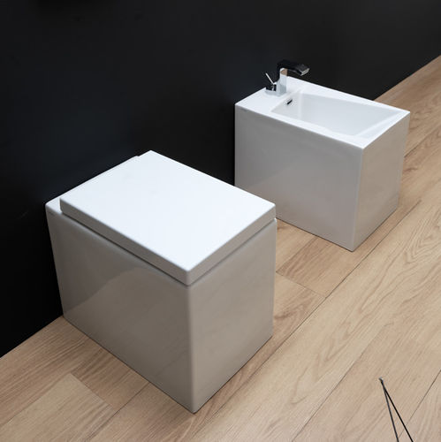 Free-standing toilet - OZWC01 - GSG Ceramic Design - back to wall / ceramic / home