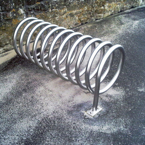 Floor-mounted bike rack - SPIRALE - FRANCE INOX INDUSTRIE - horizontal / for public space / stainless steel