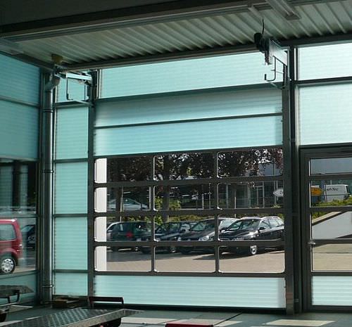 Sectional industrial door - SPACELITE HT  - Angel Mir – Portes Bisbal - fiberglass / for the food industry / semi-glazed