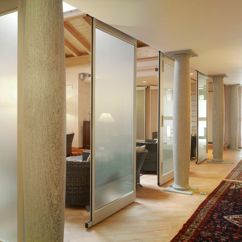 Sliding partition - WALLS - Manerba - with glass panel / metal / commercial