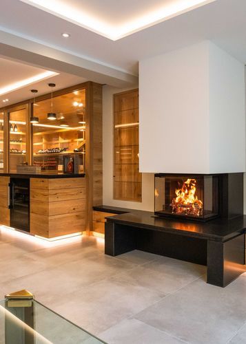 Wood-burning fireplace - RAS - Rüegg Cheminée Schweiz AG - built-in / 3-sided / closed hearth