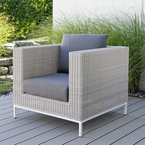 Contemporary armchair - FONTANA - STERN MOEBEL - fabric / wicker / aluminum