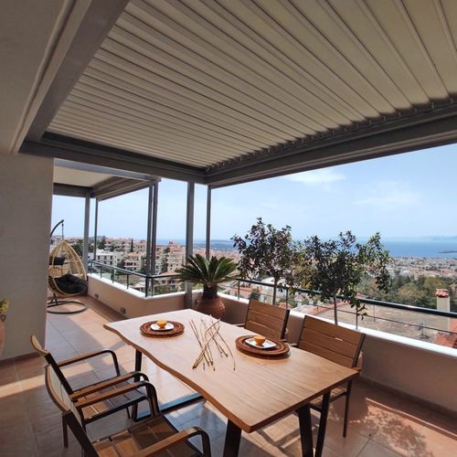 Wall-mounted pergola - COSPICON  SA - aluminum / with mobile slats / sun shade louvers