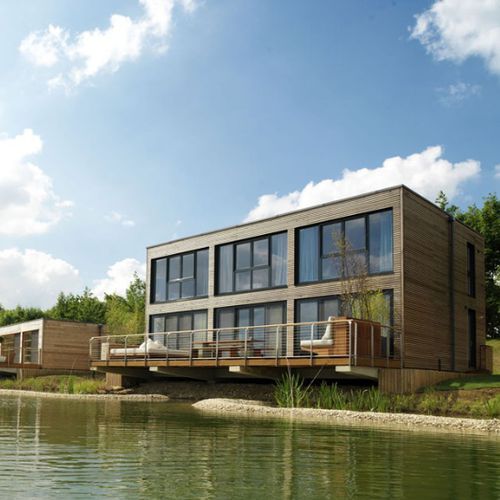Prefab building - OXFORD - Riko Hiše - solid wood / for housing developments / contemporary