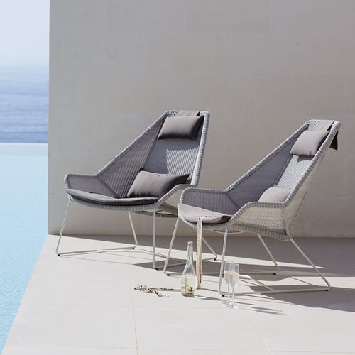 Contemporary armchair - BREEZE  - Cane-line A/S - resin wicker / resin wicker / with footrest