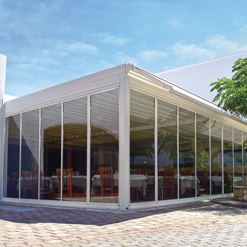 Sliding and stacking patio door - Concertina  - SPRECH S.r.l. - folding / tempered glass facing / aluminum frame