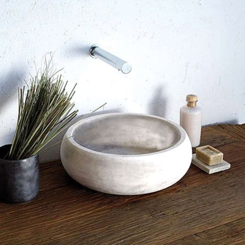 Countertop washbasin - FAVIGNANA - Petra Design s.r.l. - natural stone / round / contemporary