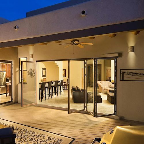 Folding patio door - FoldFlat - NanaWall - swing / wooden frame / aluminum frame