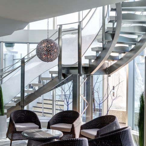 Spiral staircase - PARADISE 2200-1 - BATTIG DESIGN - concrete step / stainless steel frame / contemporary