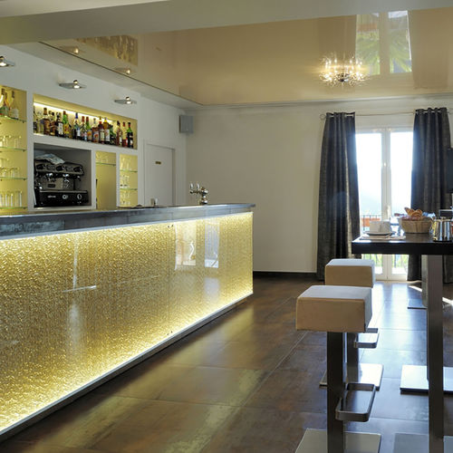 Interior decorative panel - HÔTEL DES ROCHES - DACRYL® - backlit / resin / synthetic glass