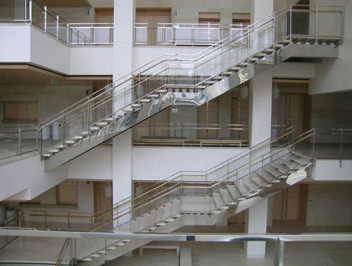 Straight staircase - 24602 - Couturier Iron Craft - stone step / metal frame / for commercial buildings