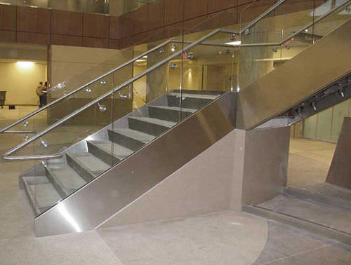 Quarter-turn staircase - 43408 - Couturier Iron Craft - concrete step / metal frame / for commercial buildings