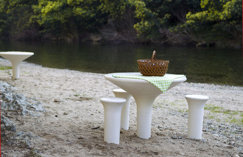 Contemporary stool - AMOPLAY : BENCH - A Amop Synergies - concrete / central base / commercial