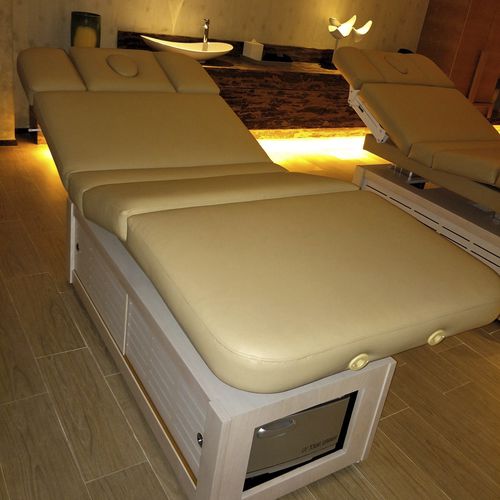 Electric massage table - EMBRACE  - Touch America - wooden / polyurethane foam / height-adjustable