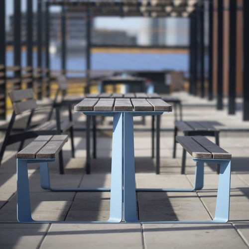 Contemporary picnic table - RAUTSTER - mmcité street furniture - wooden / steel / HPL