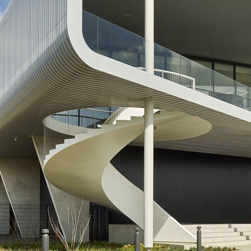 High-end staircase - BARNEVELD  - EeStairs - helical / concrete step / concrete frame