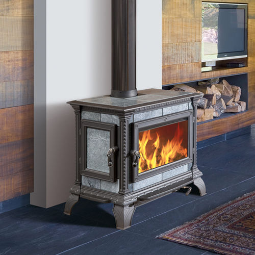 Wood heating stove - HERITAGE - HERGÓM - 10 kW...20 kW / free-standing / traditional