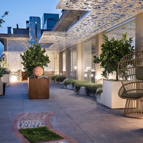 Aluminum screen wall - Logical Space design - COR-TEN® steel / patio