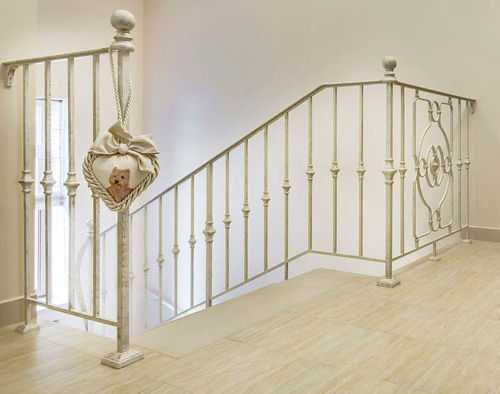 Wrought iron railing - CITY - GRANDE FORGE - with panels / with bars / indoor