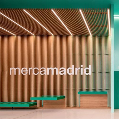 Wooden wall - Grupo GUBIA - with modular panels / prefab