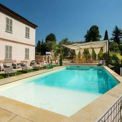 Custom swimming pool - Forma Libera - Piscine Acquaform - integrated coping / outdoor / in-ground
