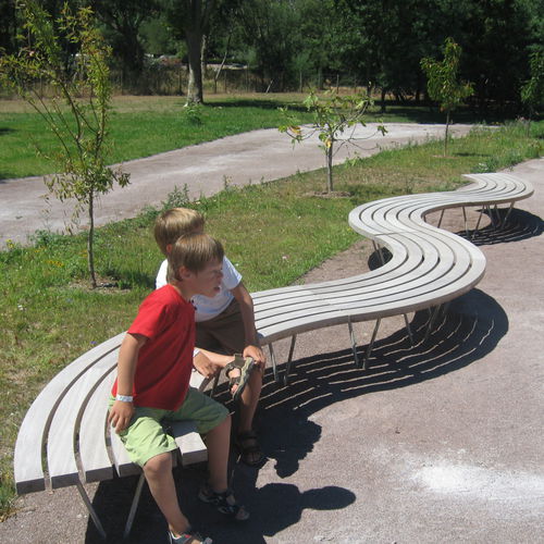 Contemporary public bench - SINU - NORCOR MOB.URBAIN - exotic wood / stainless steel / modular
