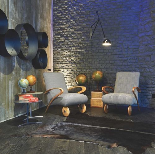 Original design armchair - ROLLING - Mazzoli Design - leather / fabric / polyurethane