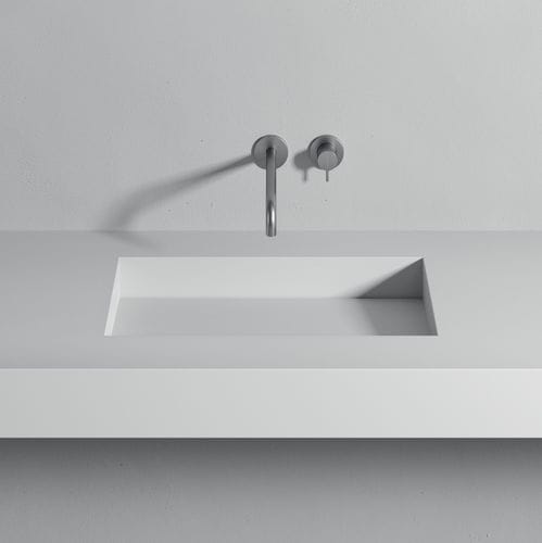 Built-in washbasin - SCIVOLO  - Rexa Design - Corian® / with counter / round