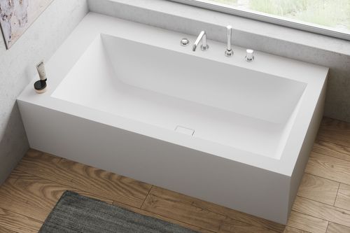Free-standing bathtub - MIRAKLON BWP - Hasenkopf - for homes / Corian® / contemporary