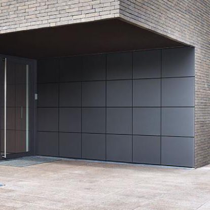Sectional garage door - PUMA LINE STX - l-door - aluminum / automatic