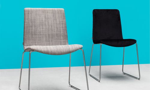 Contemporary chair - LINAR  - NOTI - indoor / fabric / stacking