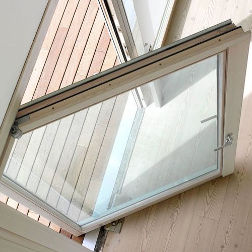 Wooden window - INTESA 87 - isamserramenti - aluminum / bronze / tilting