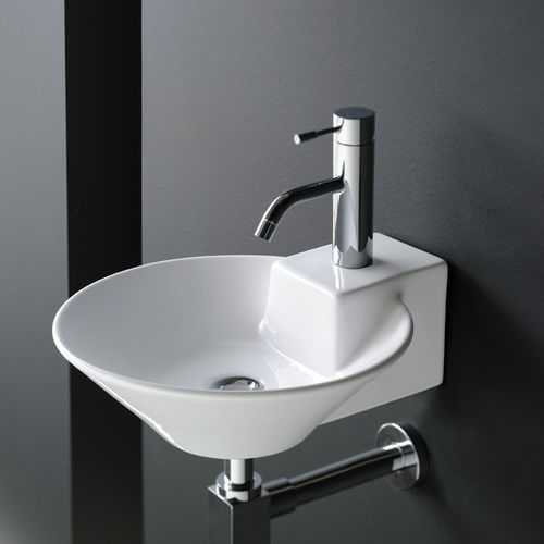 Wall-mounted washbasin - BIARRITZ - Bath Collection S.L. - porcelain / round / contemporary