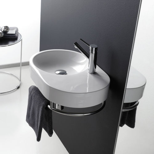 Wall-mounted washbasin - FUENGIROLA - Bath Collection S.L. - porcelain / oval / contemporary