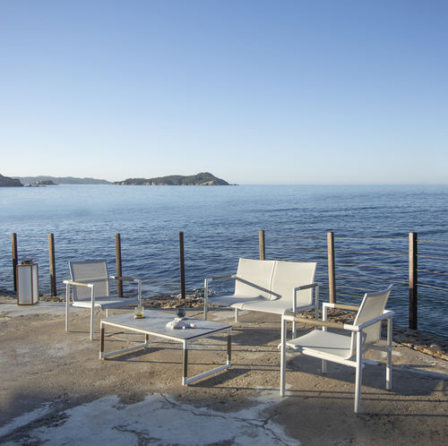 Contemporary armchair - BASTINGAGE - LES JARDINS - canvas / teak / aluminum
