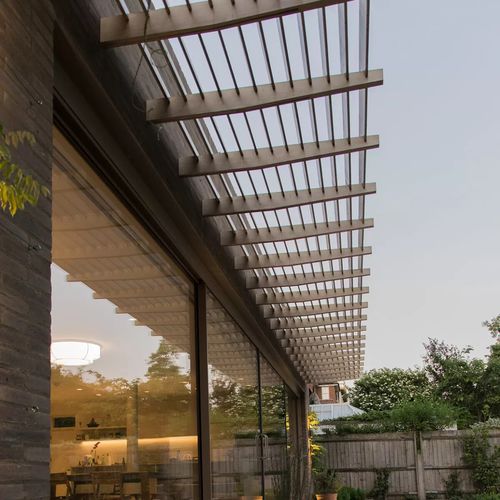 Wall-mounted pergola - NORTH LONDON - Accsys Technologies - wood / glass / contemporary