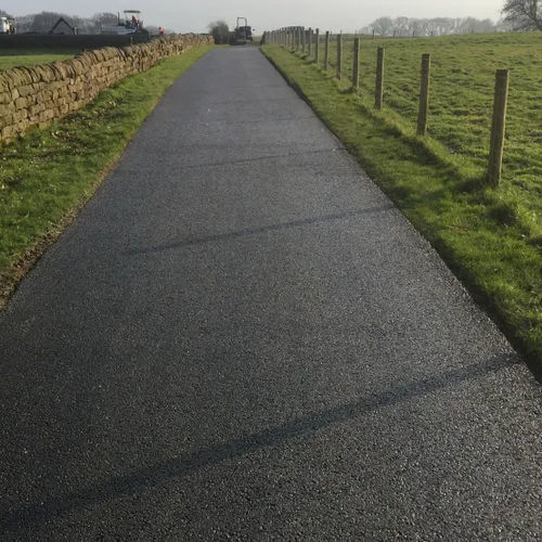 Concrete flooring - SUPERBASE™ - Aggregate Industries - asphalt / for outdoor use / tertiary
