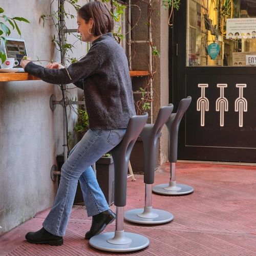 Contemporary bar chair - COWBOY  - SEGIS - indoor / polyurethane / powder-coated steel base