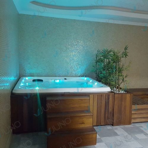 Above-ground swimming pool-spa - Juno SPA Design & Manufacture - rectangular / multiplace / composite